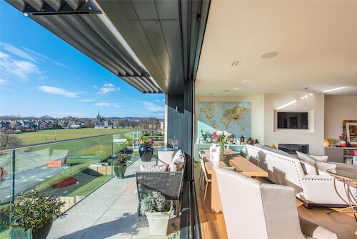 Living room opening out onto balcony