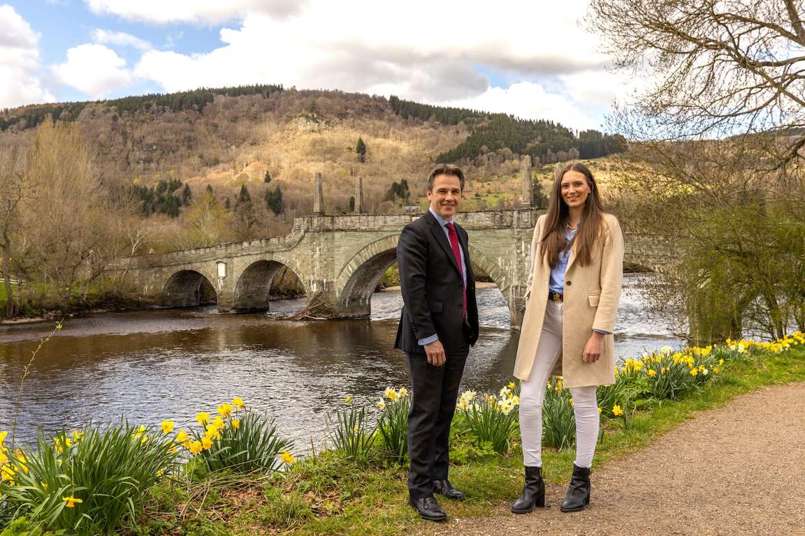 Alastair Houlden and Joanna Tinson standing riverside in Perthshire