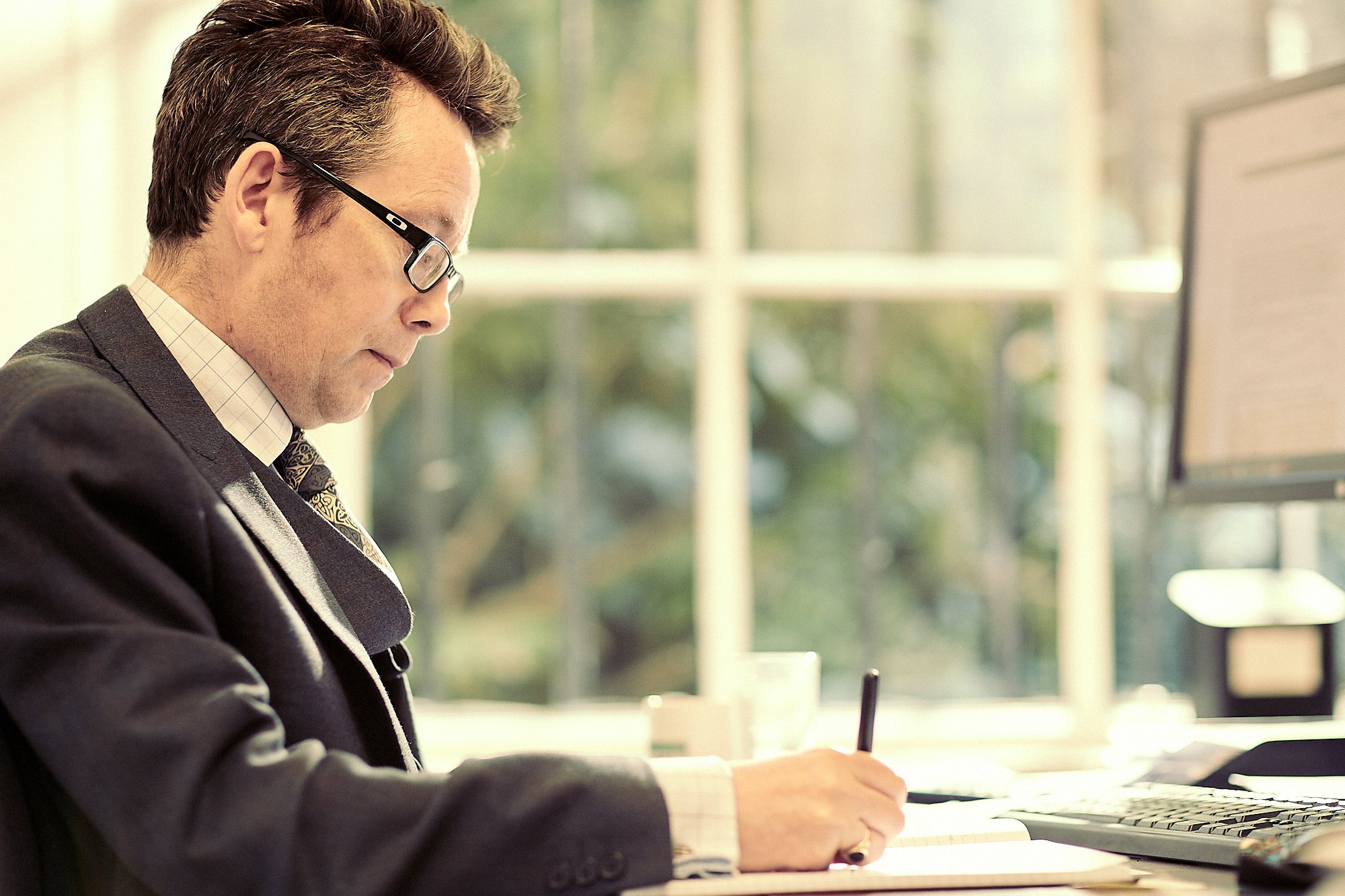 Dr John Boyle, Head of Research, working at his desk