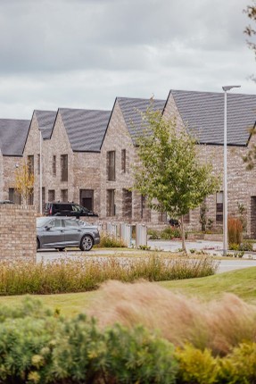 Established streets and planting at St Andrews West.