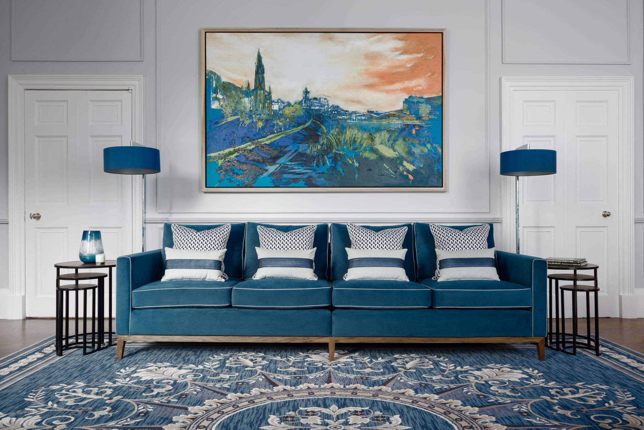 Image of blue sofa with four cushions