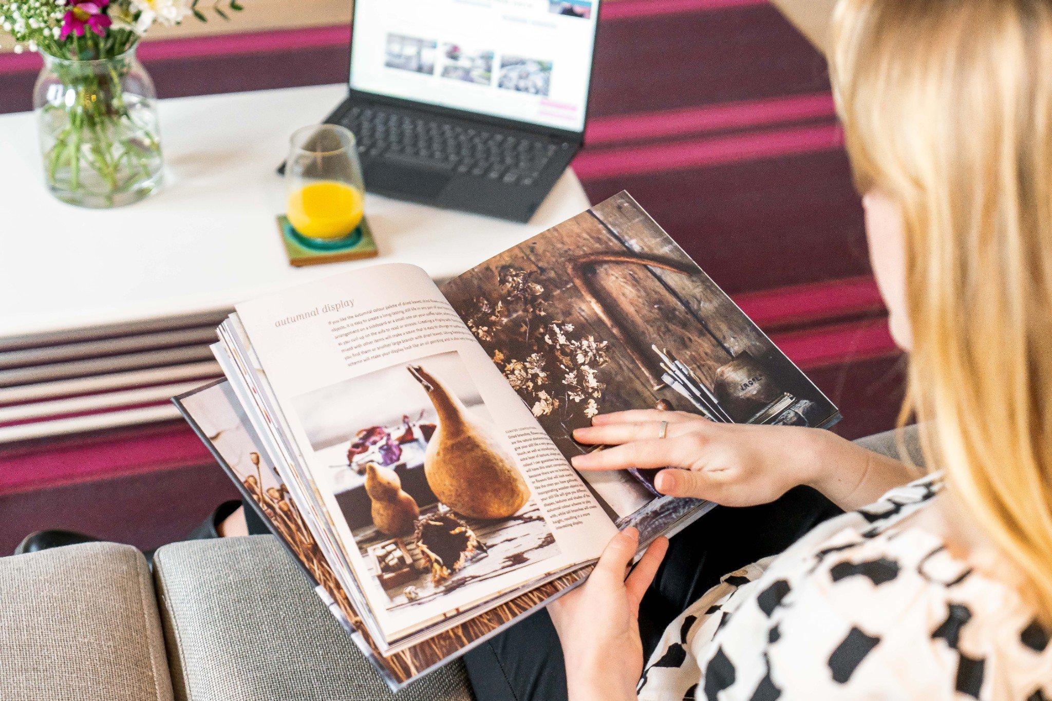 Young lady looking at magazine