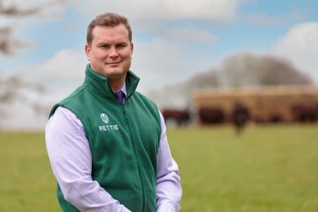 Fergus Thomson with cattle in the background.