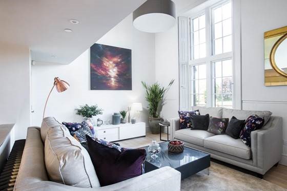 Living room with sofas and large picture window