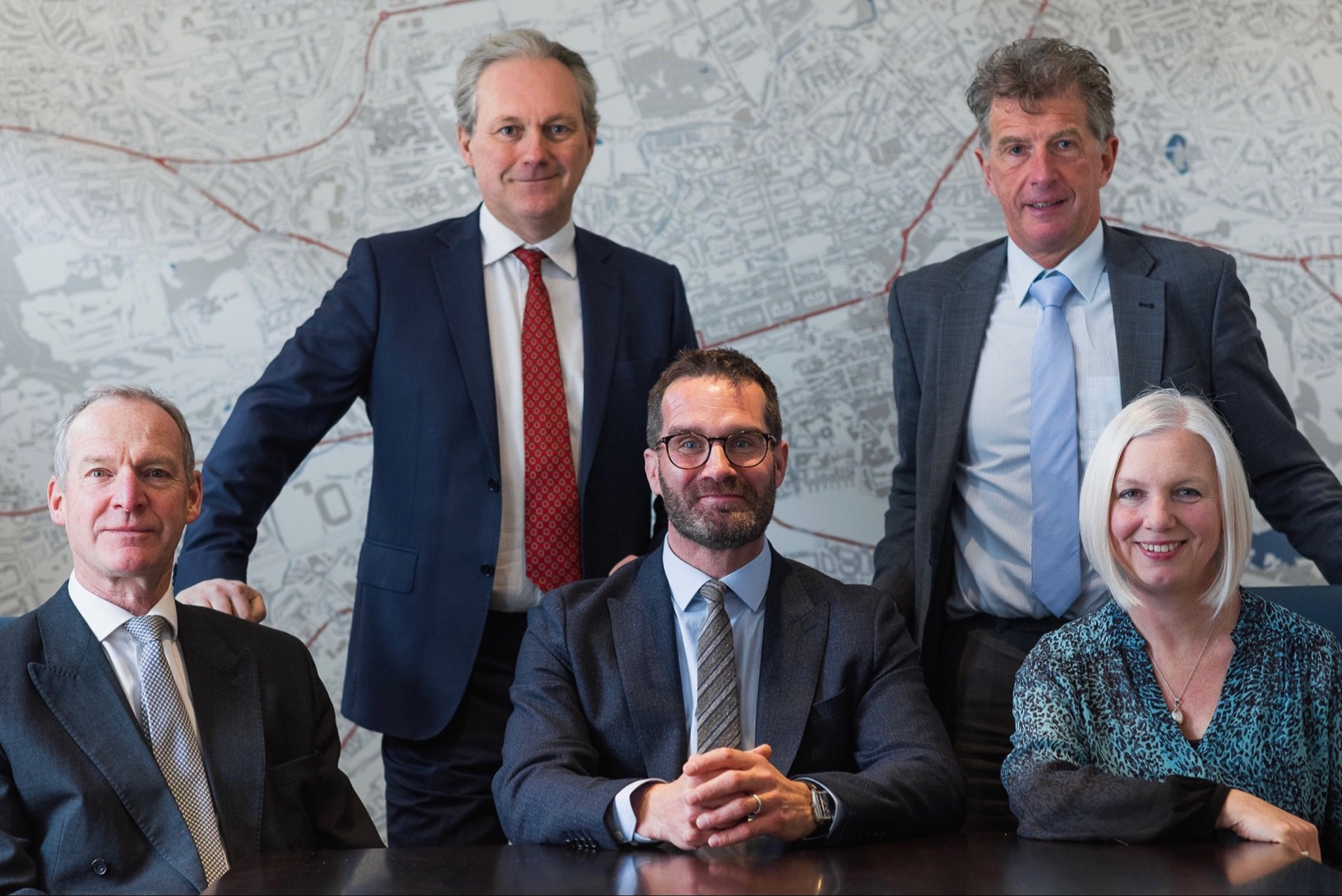 Featured in Image from Left to Right: Simon Rettie FRICS (Managing Director), Matthew Benson (Director, Development Services), Neil Cunningham (Commercial Director), David Gibson (Finance Director), Becky Lindsay (Chief Operating Officer)